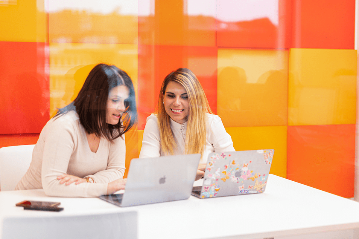 corporate rewards - employees on laptops