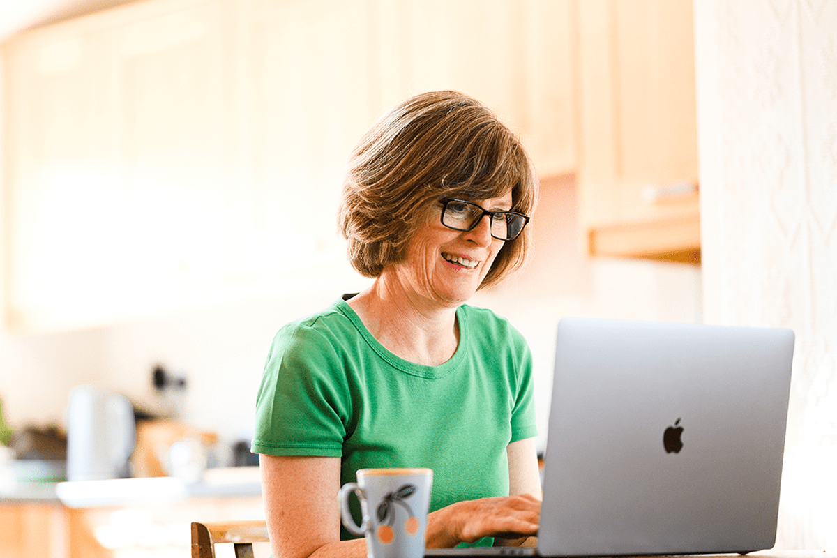 salary deduction programme - employee on laptop